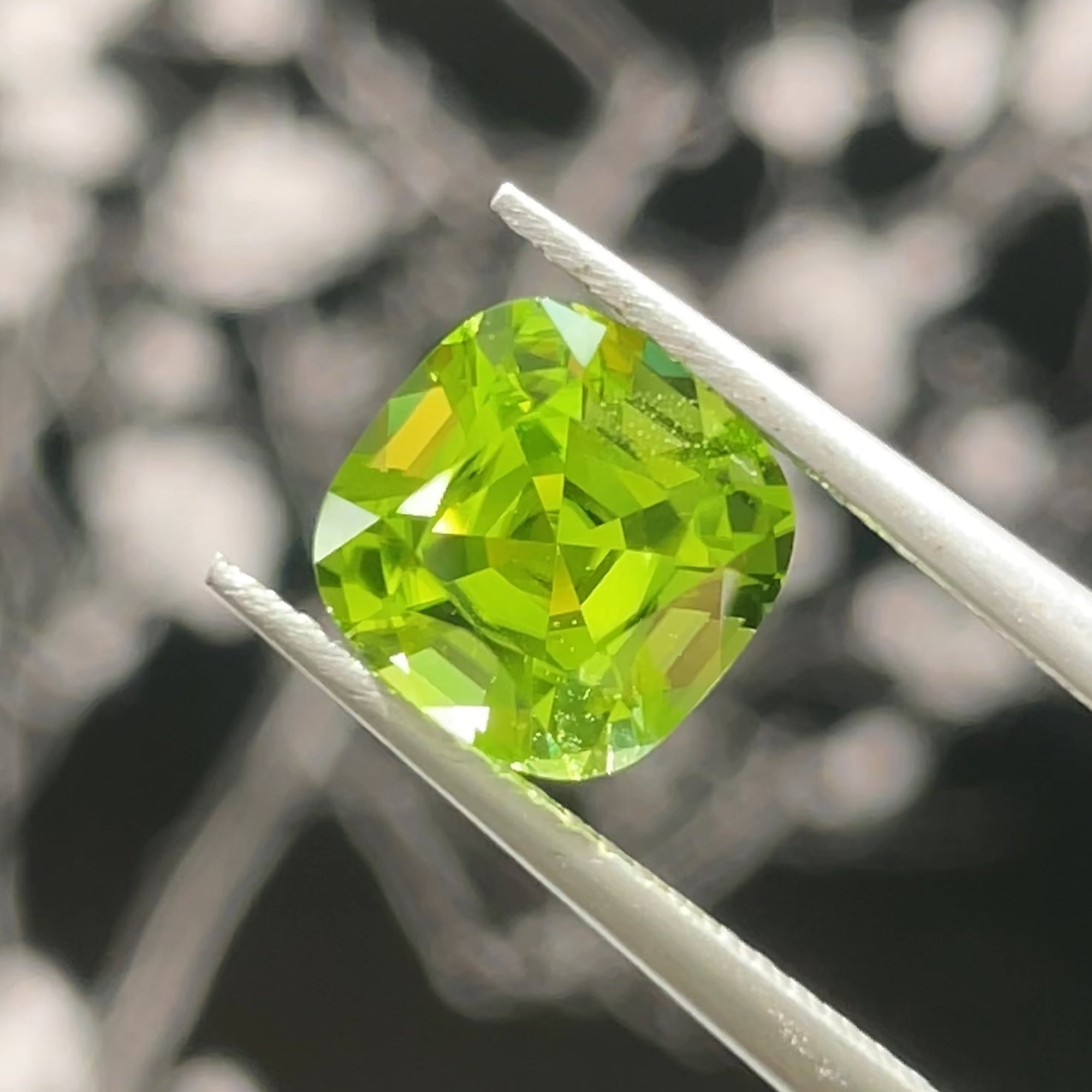 2.95 ct Apple Green Peridot from Pakistan, precision cut, face-up, view 10
