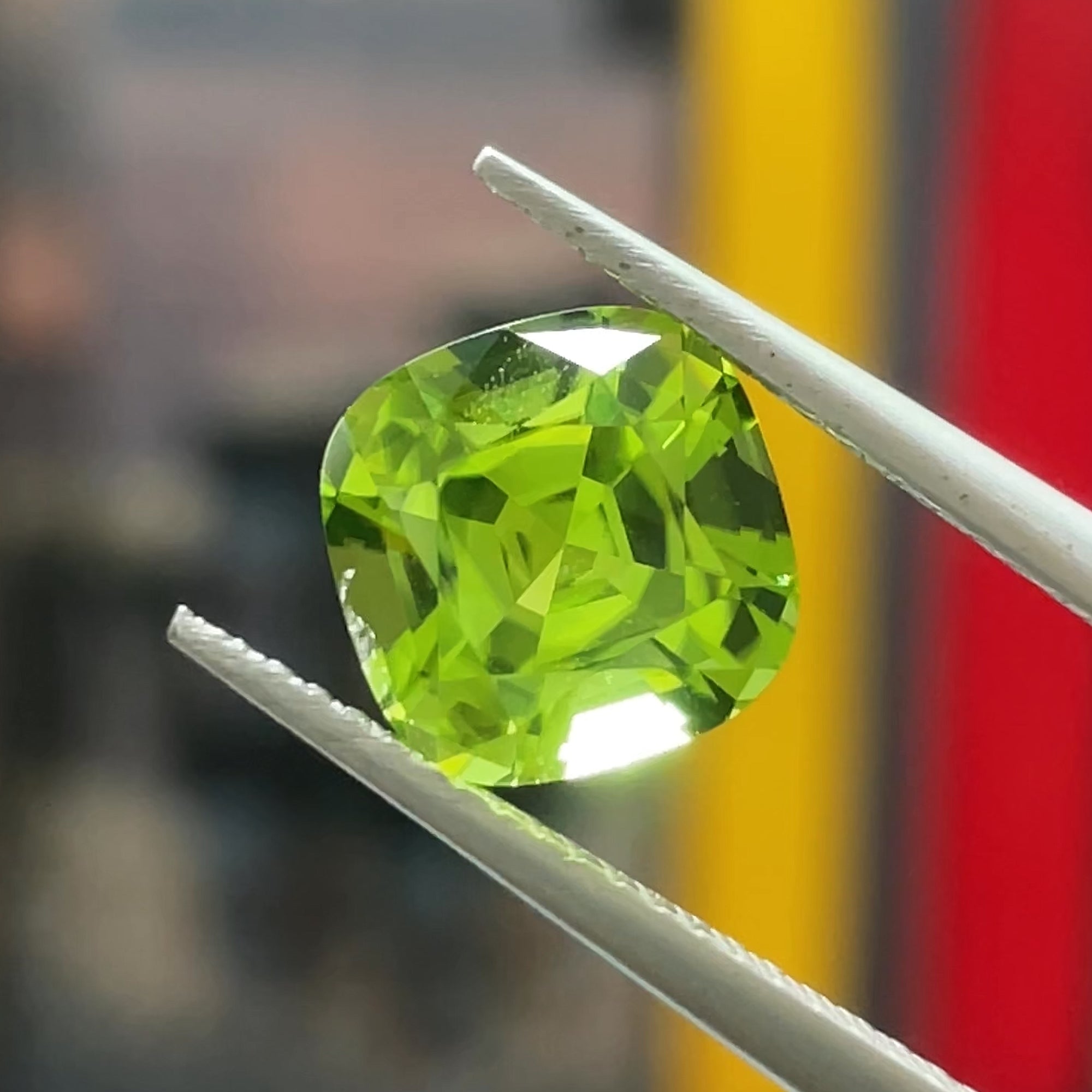 2.95 ct Apple Green Peridot from Pakistan, precision cut, face-up, view 9
