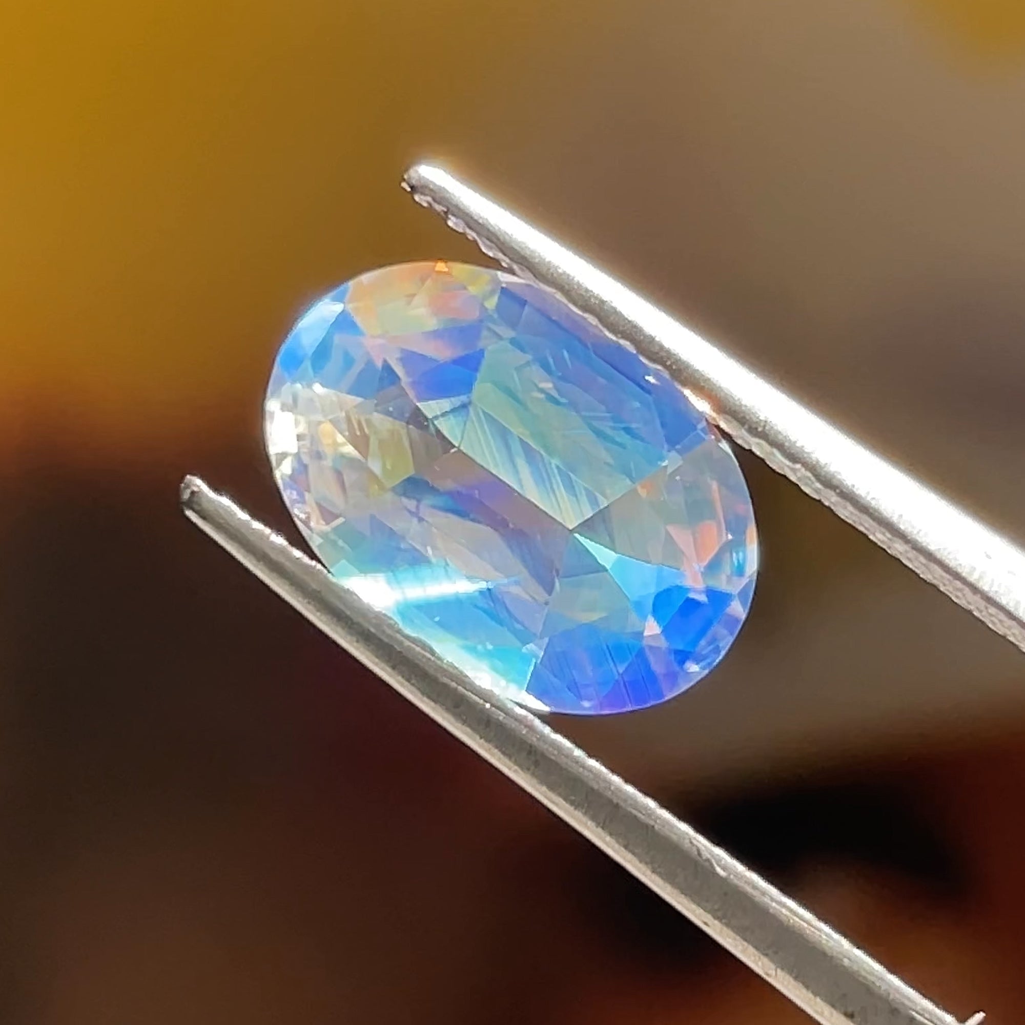 2.22 ct Rainbow Moonstone from Madagascar, precision cut, face-up, view 9