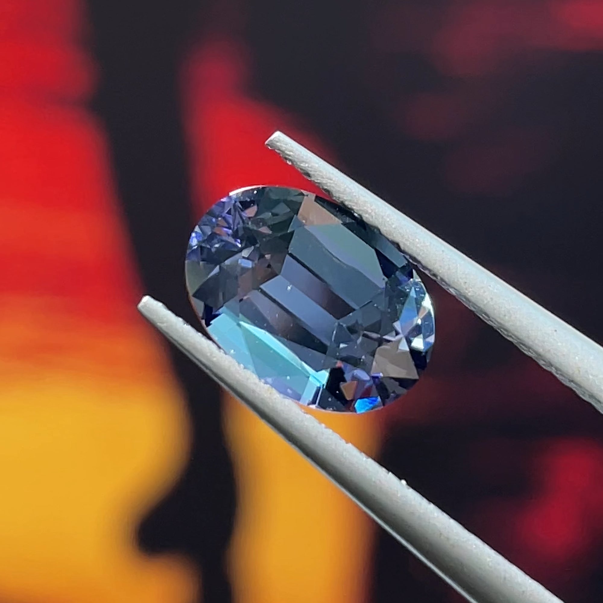 1.98 ct Unheated Peacock Tanzanite, precision cut, face-up, view 11