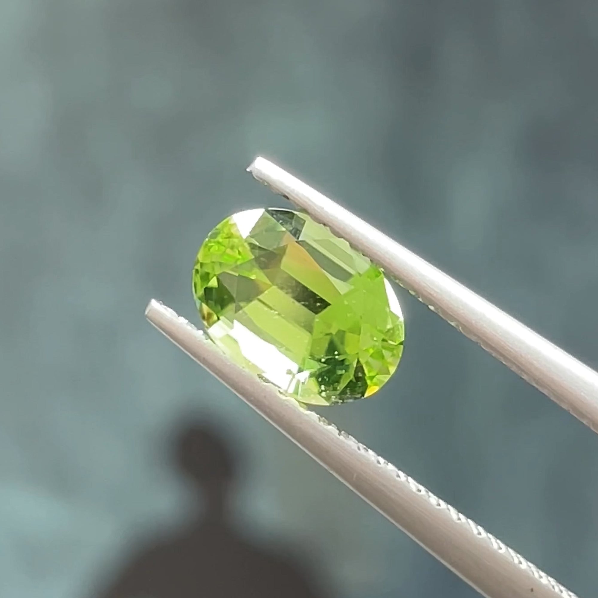1.41 ct Apple Green Peridot from Pakistan, precision cut, face-up, view 8