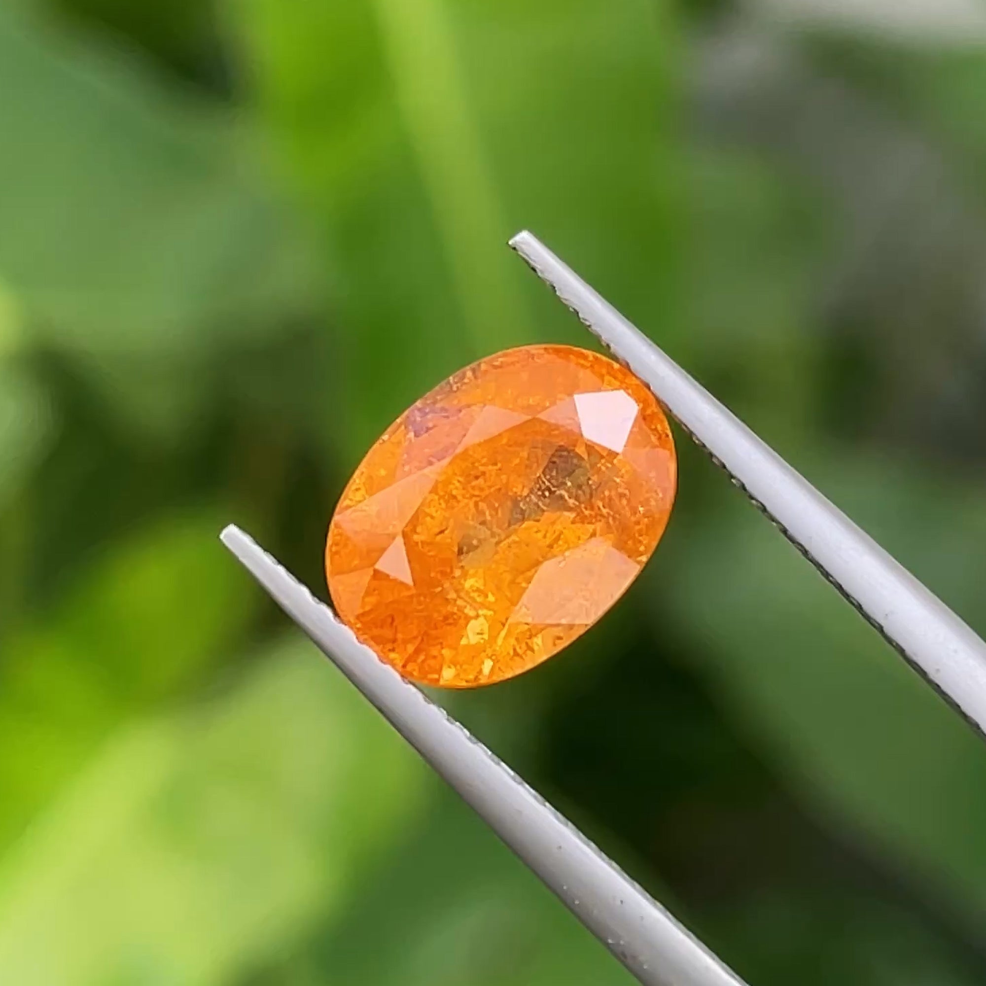5.20 ct Fanta Garnet, precision cut, face-up, view 10
