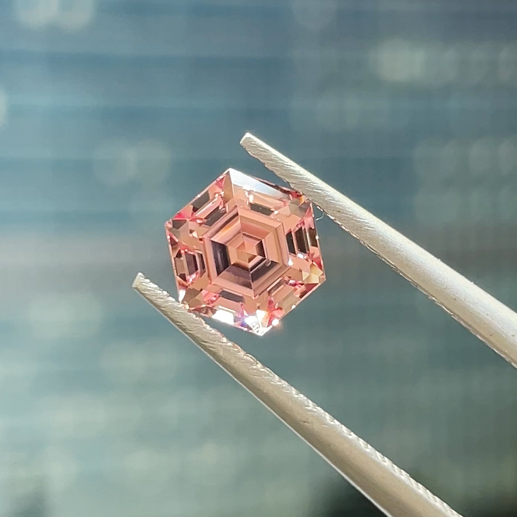 1.26 ct Peachy-Pink Mahenge Garnet, precision cut, face-up, view 12