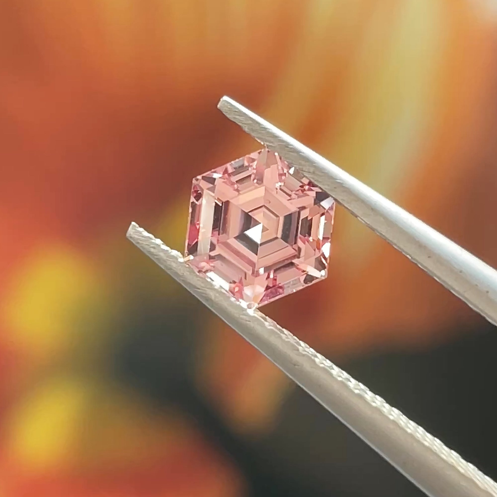 1.26 ct Peachy-Pink Mahenge Garnet, precision cut, face-up, view 8