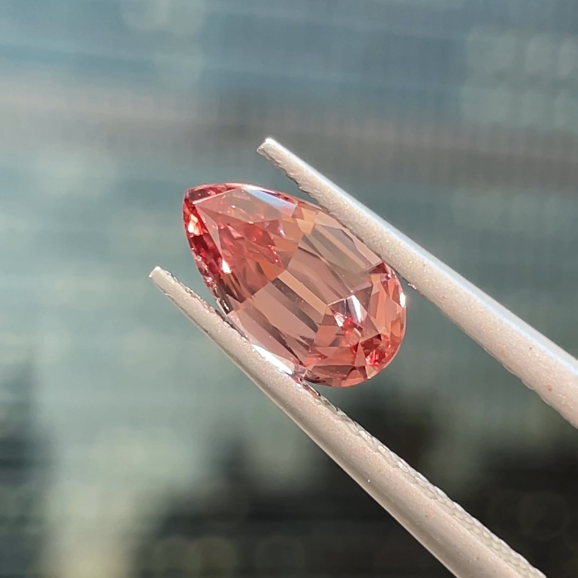 1.88 ct Unheated Peachy Pink Zircon from Mozambique, precision cut, face-up, view 11