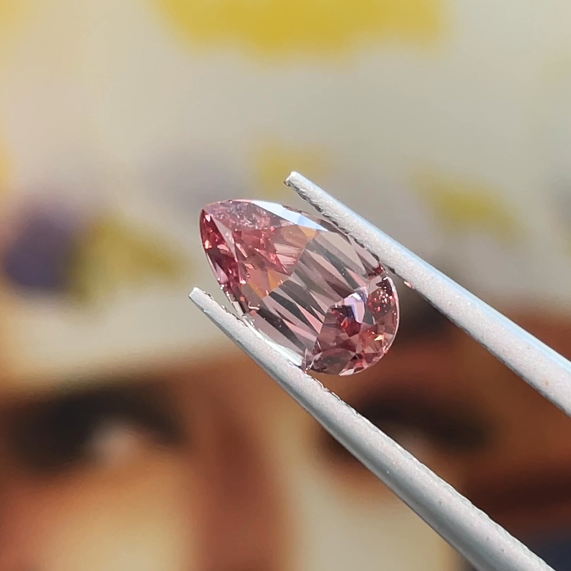 1.88 ct Unheated Peachy Pink Zircon from Mozambique, precision cut, face-up, view 14
