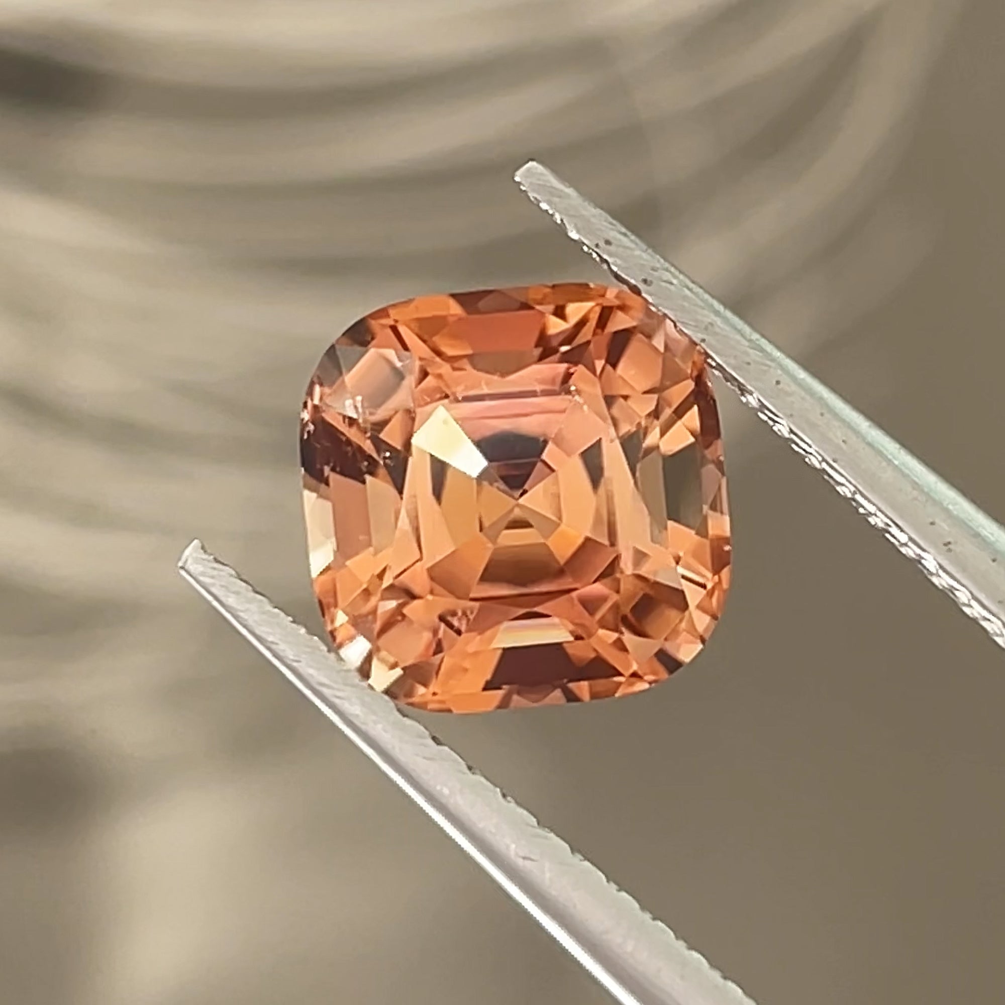 2.55 carat Peach Tourmaline from Congo, Precision cut in Square Cushion, Grey background