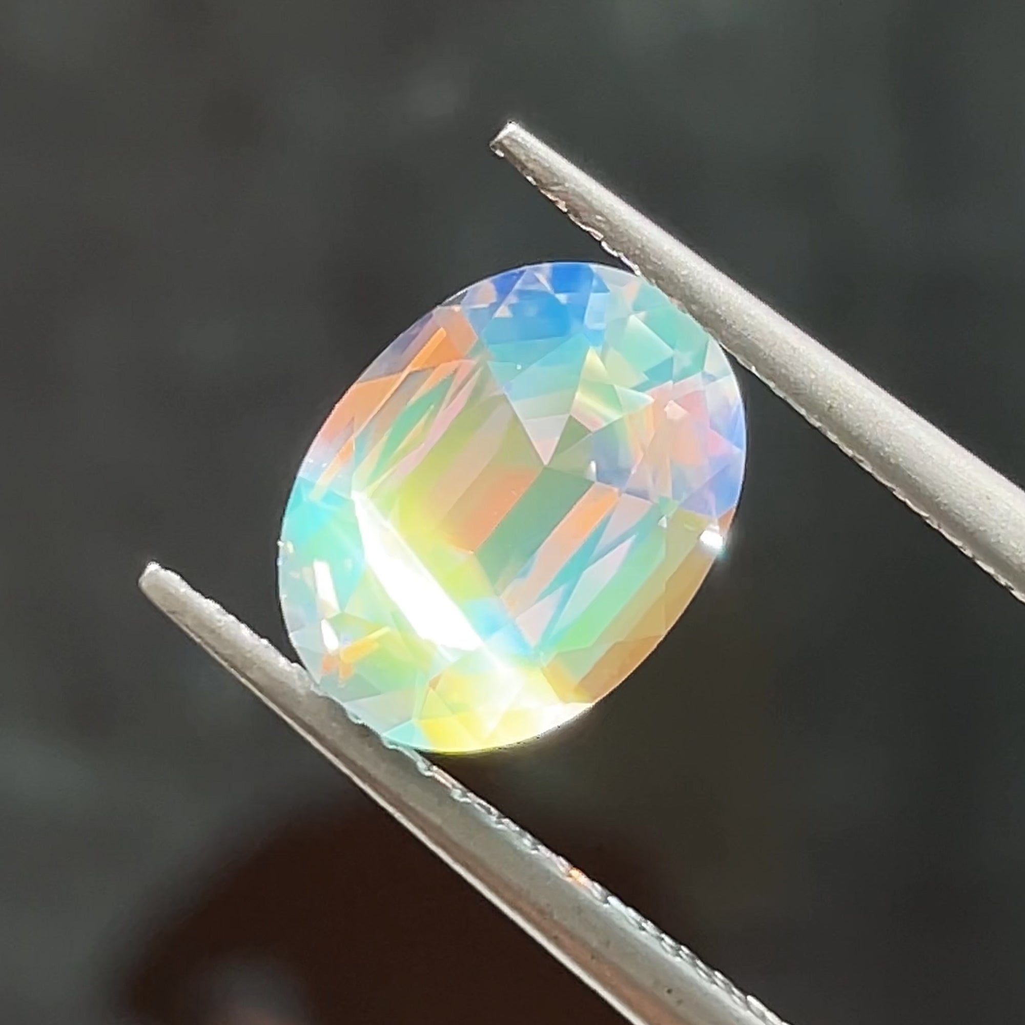 Precision Cut 2.21 ct Faceted Rainbow Moonstone, face-up view vertical