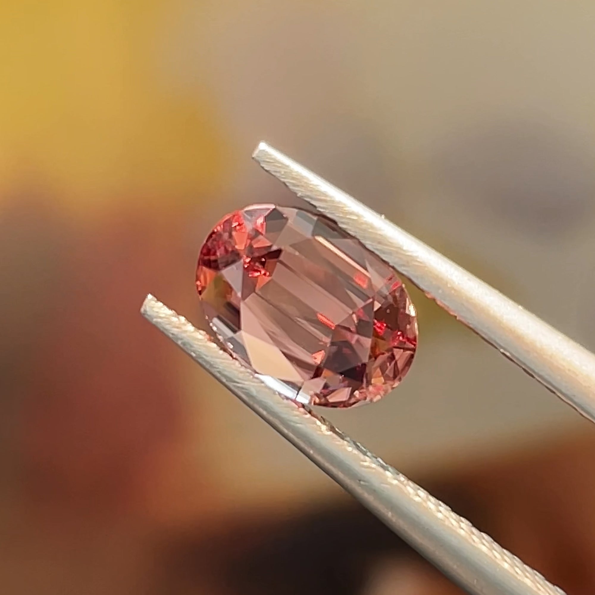 1.66 ct Unheated Peachy Pink Zircon from Mozambique, precision cut, face-up, view 9