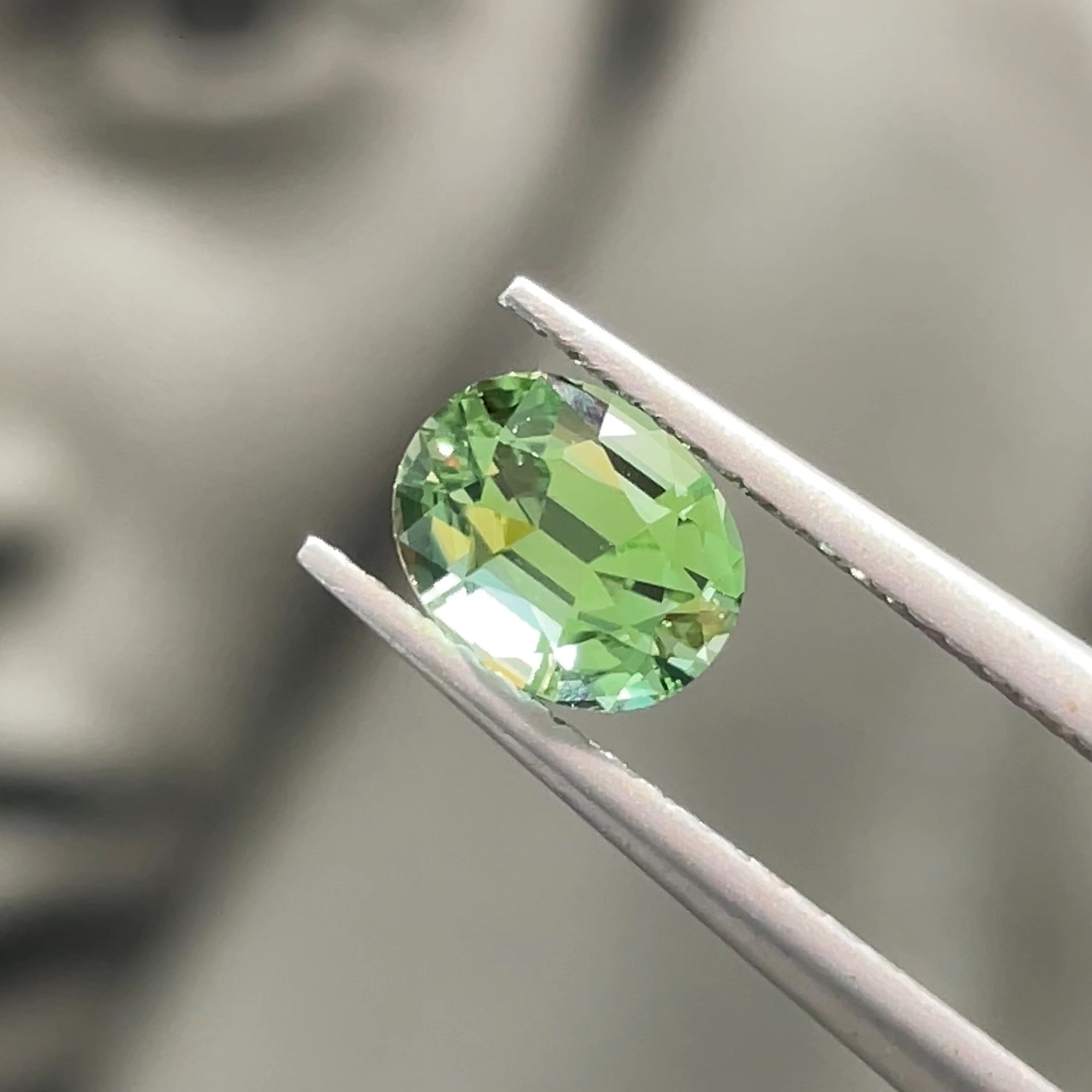 1.10 ct Apple Green Tourmaline from Congo, precision cut, face-up, view 10