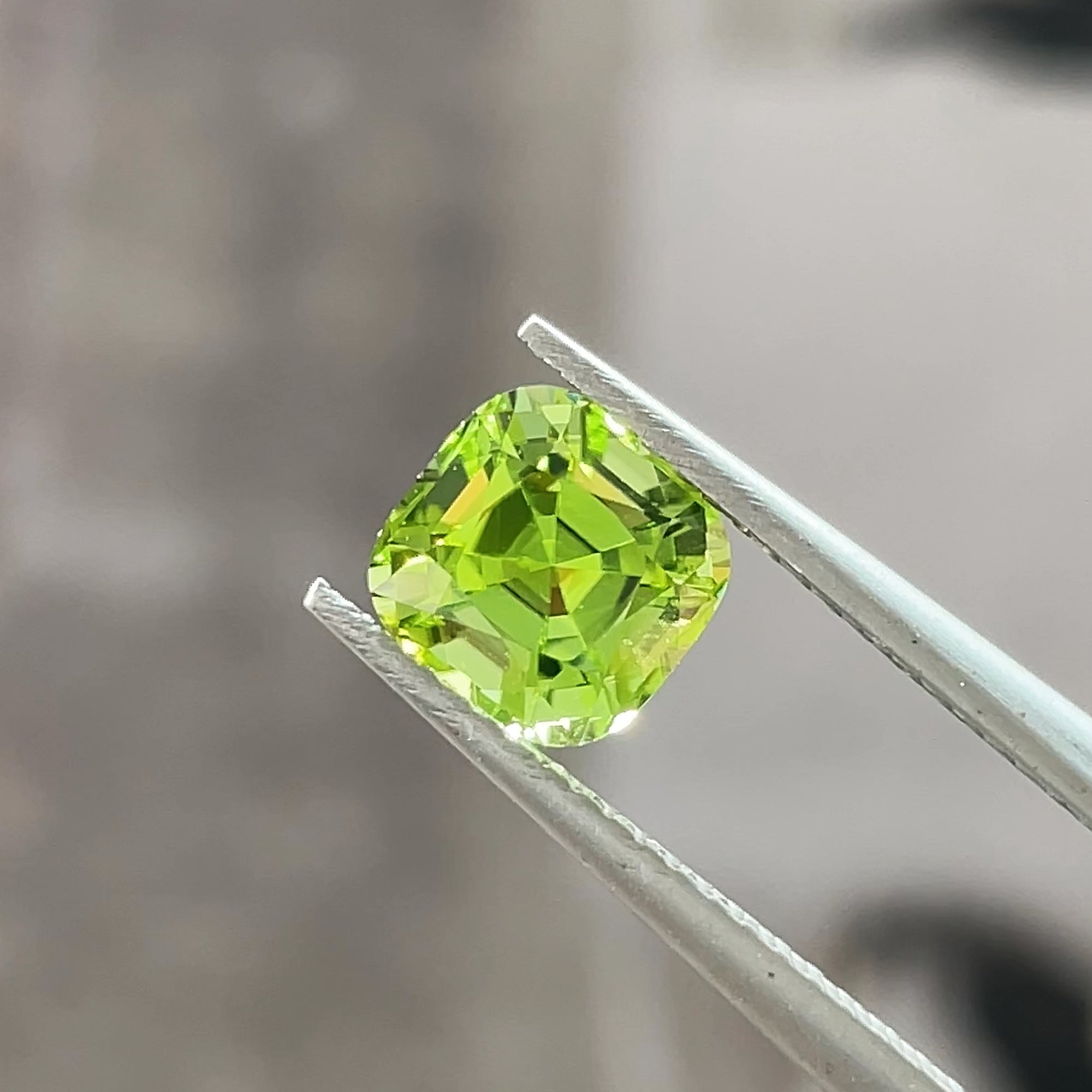 1.58 ct Apple Green Peridot from Pakistan, precision cut, face-up, view 9