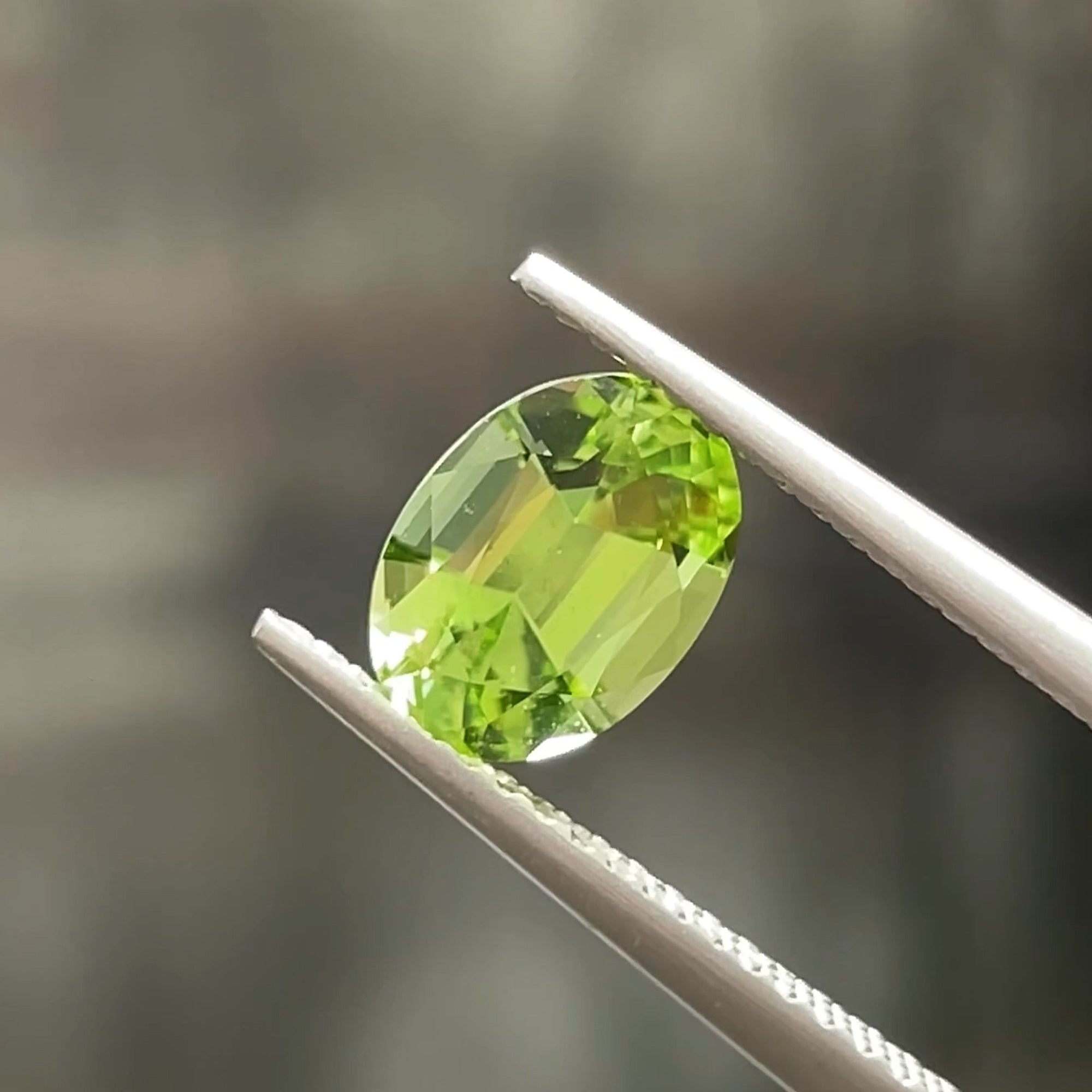 1.41 ct Apple Green Peridot from Pakistan, precision cut, face-up, view 7