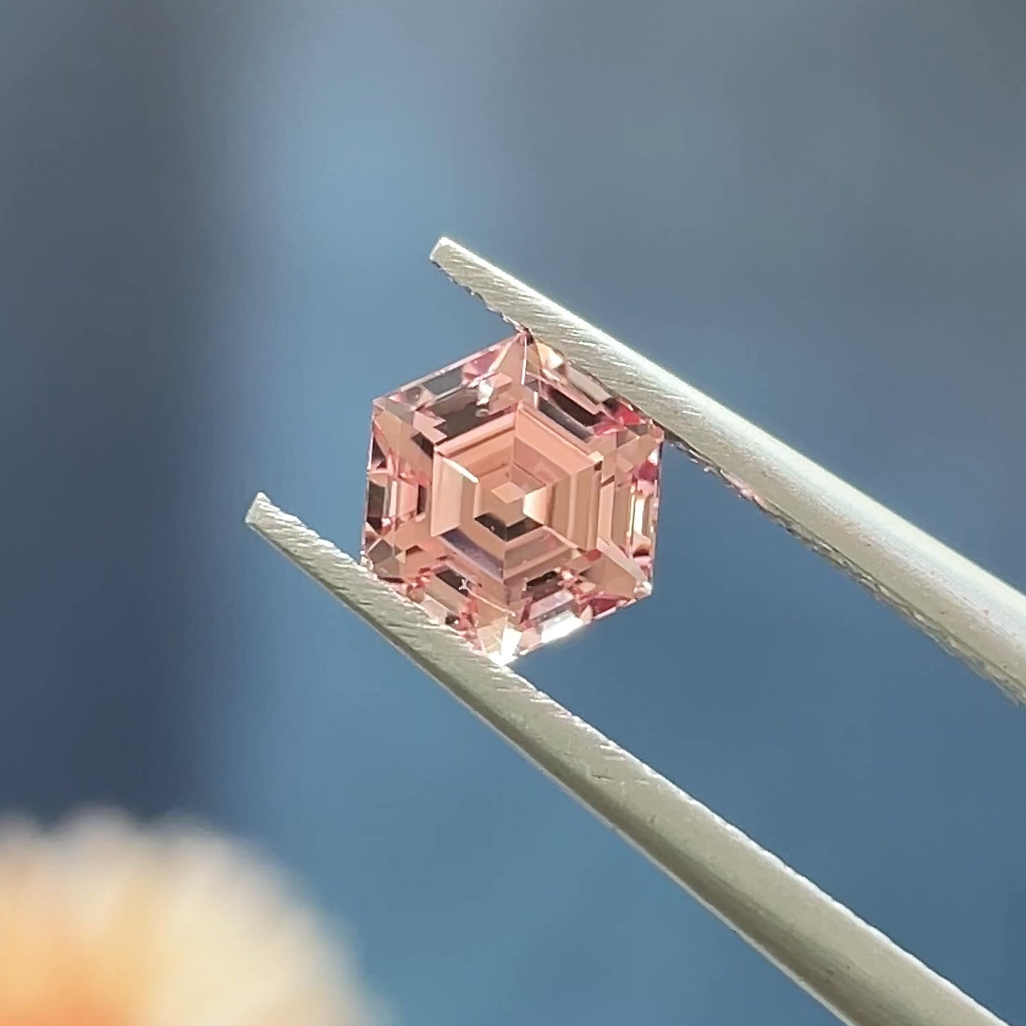 1.26 ct Peachy-Pink Mahenge Garnet, precision cut, face-up, view 9