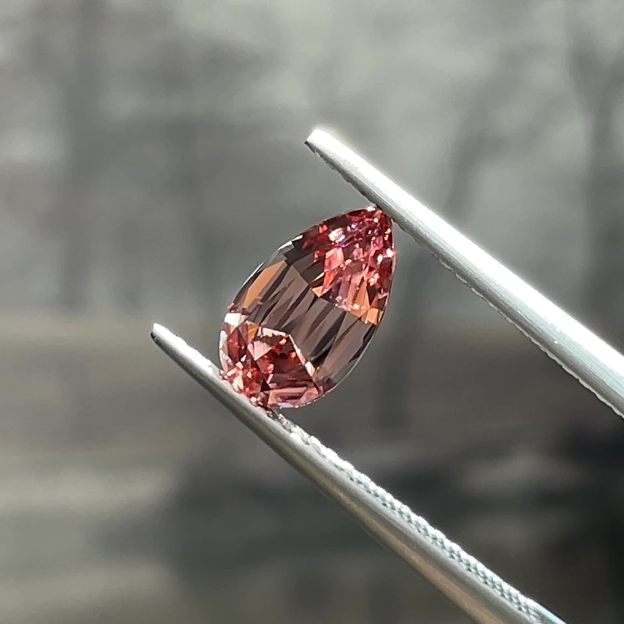 1.88 ct Unheated Peachy Pink Zircon from Mozambique, precision cut, face-up, view 9