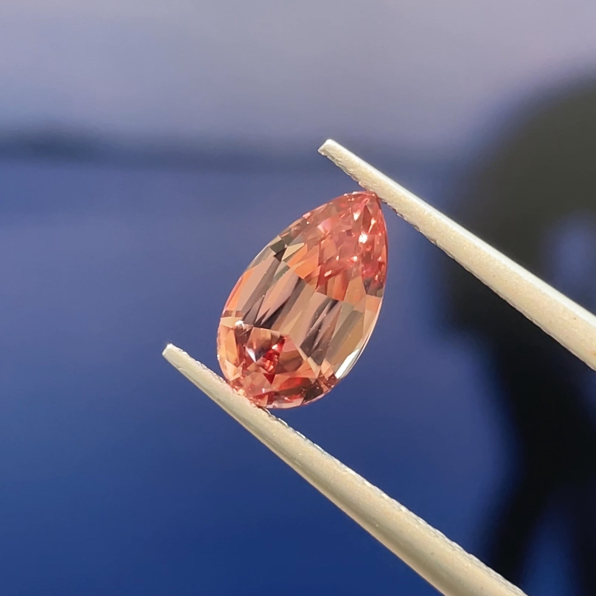 1.88 ct Unheated Peachy Pink Zircon from Mozambique, precision cut, face-up, view 13