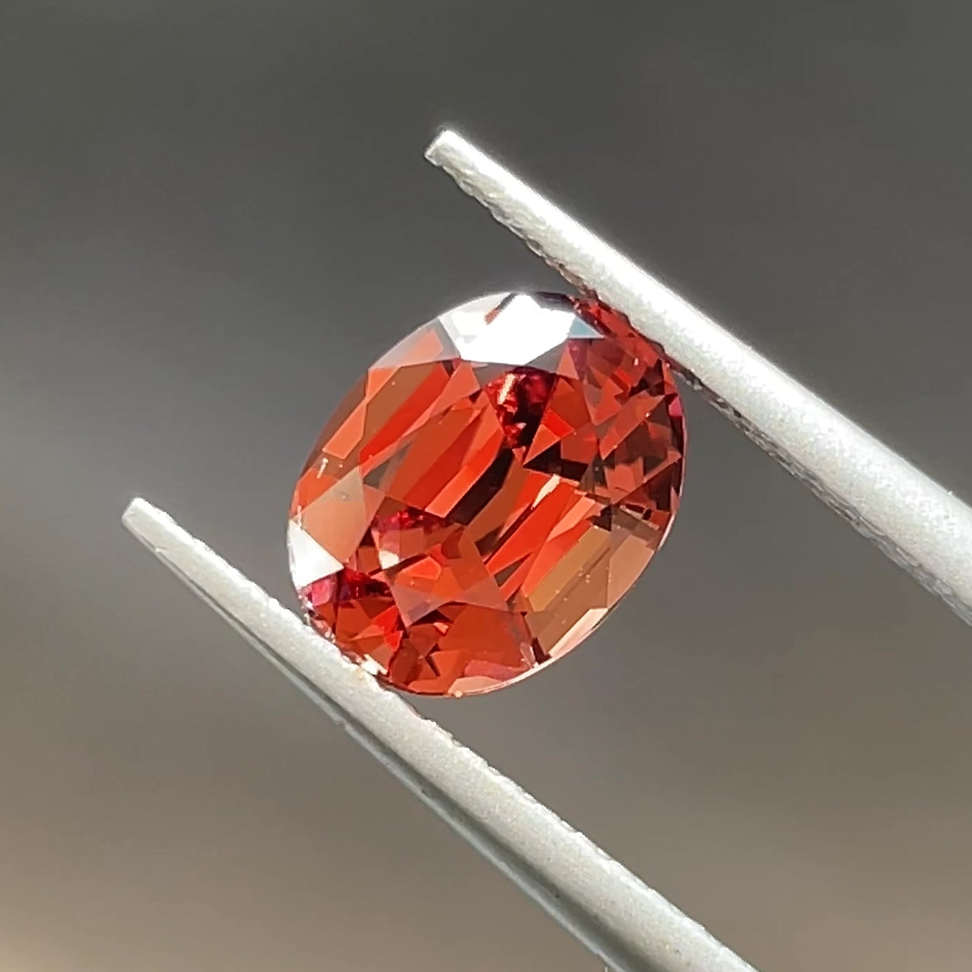 1.93 ct Orangey Red Malaya Garnet from Umba, precision cut, view 11