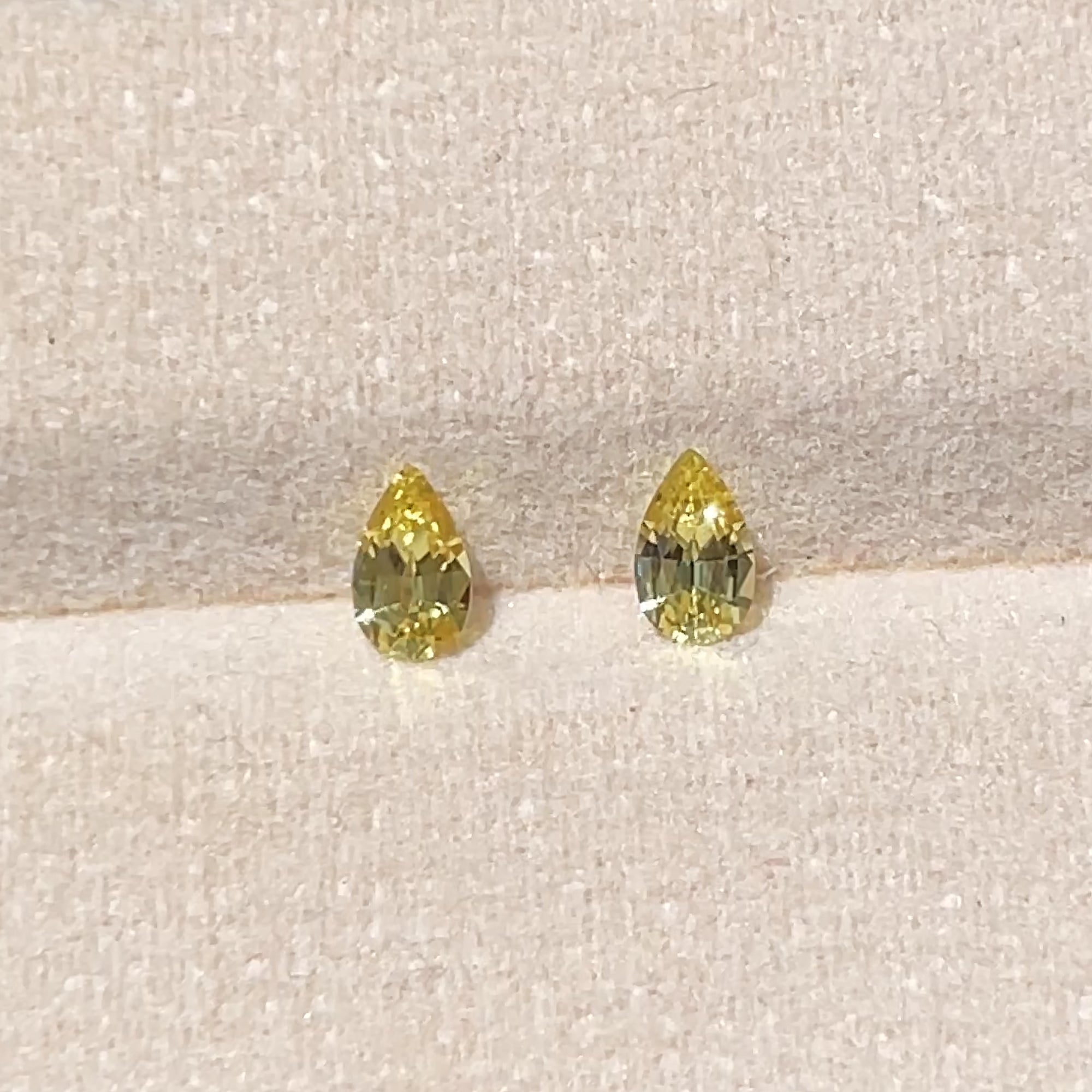 Unheated Yellow Sapphire Pair from Kenya, sunlight view