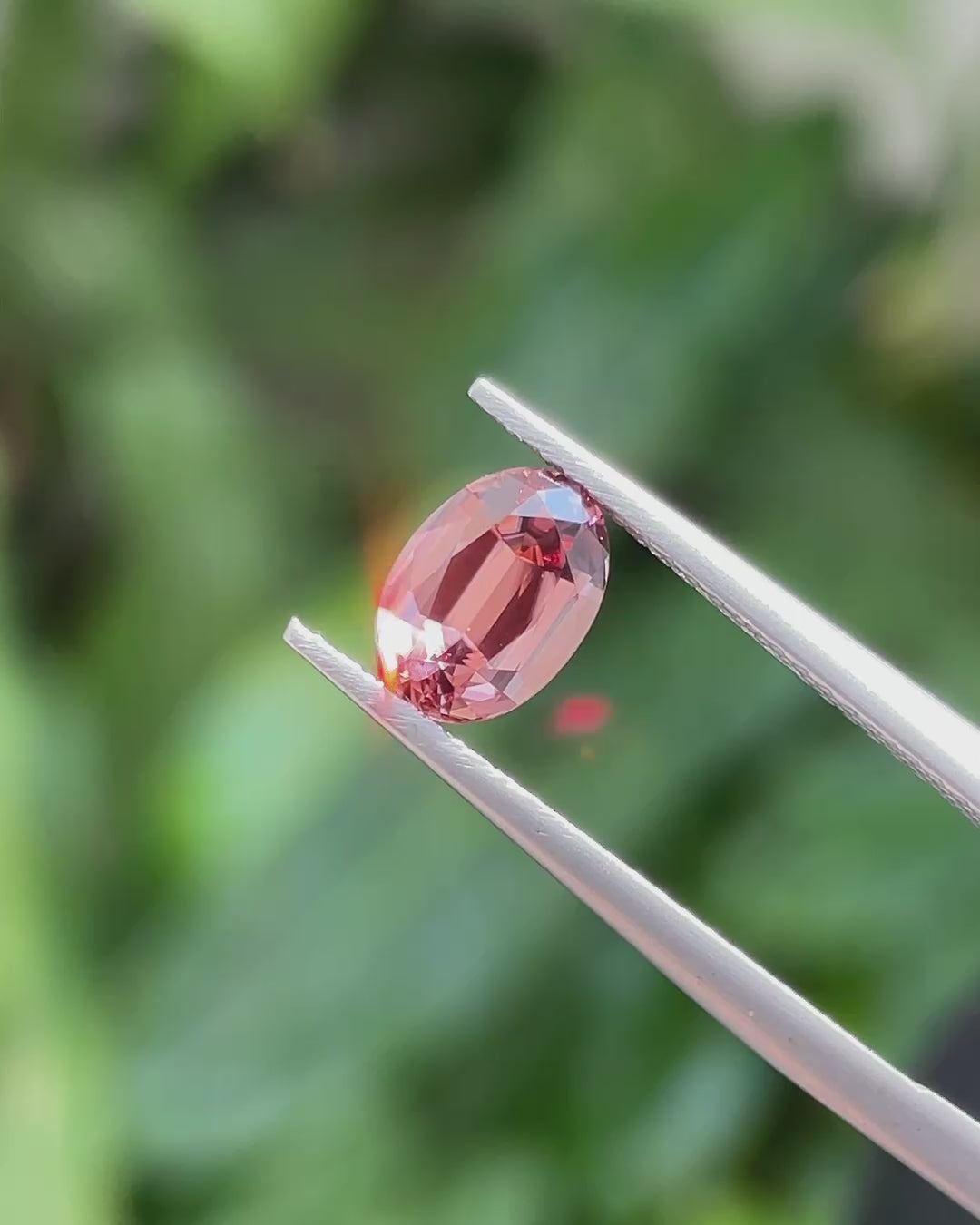 1.66 ct Unheated Peachy Pink Zircon from Mozambique, precision cut, face-up, view 2