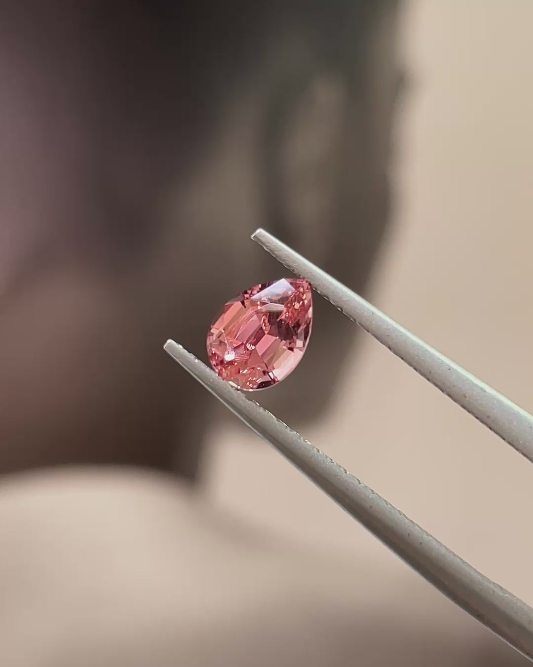 0.68 ct Coral-Pink Tourmaline from Congo, precision cut, face-up, view 2