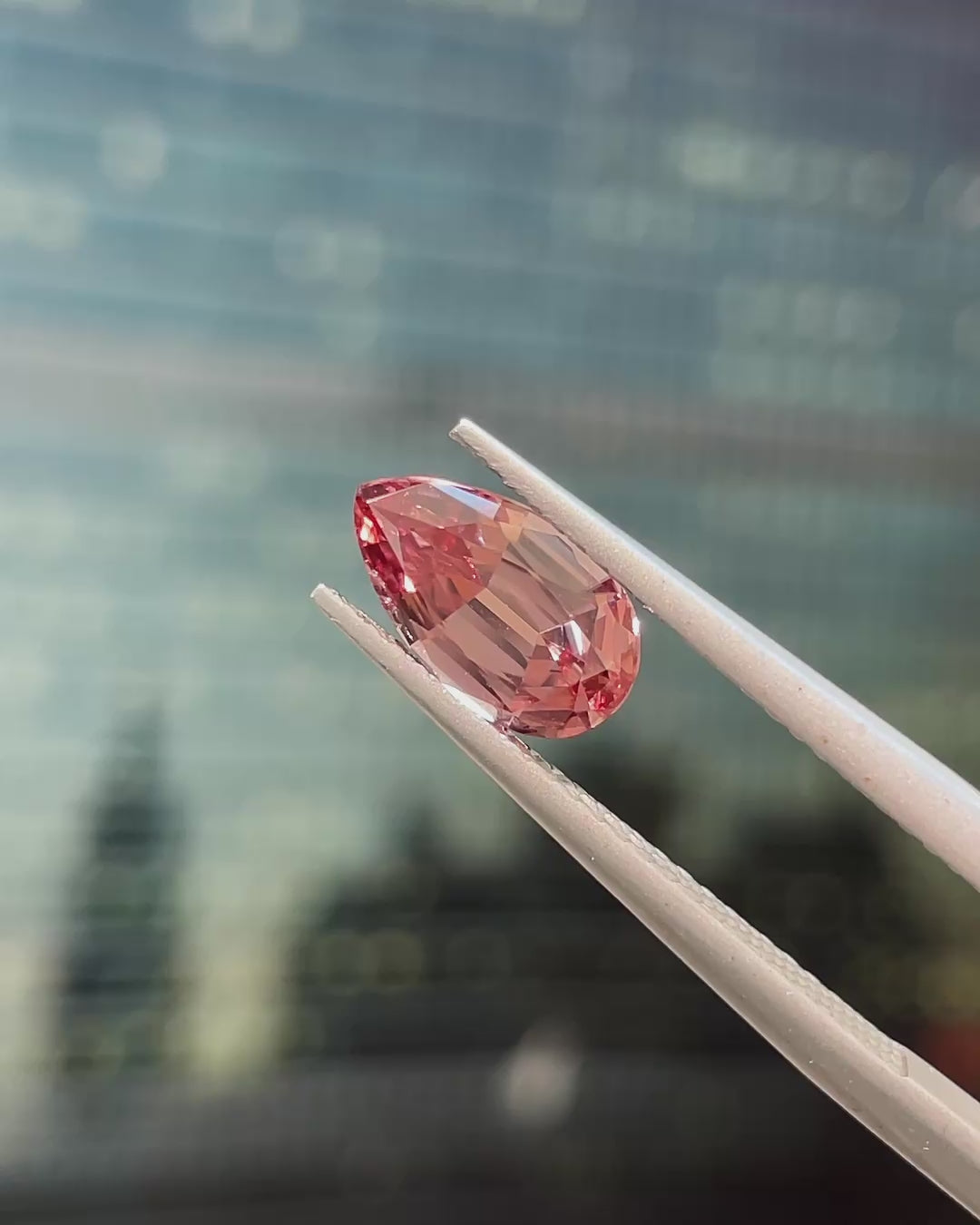 1.88 ct Unheated Peachy Pink Zircon from Mozambique, precision cut, face-up, view 2