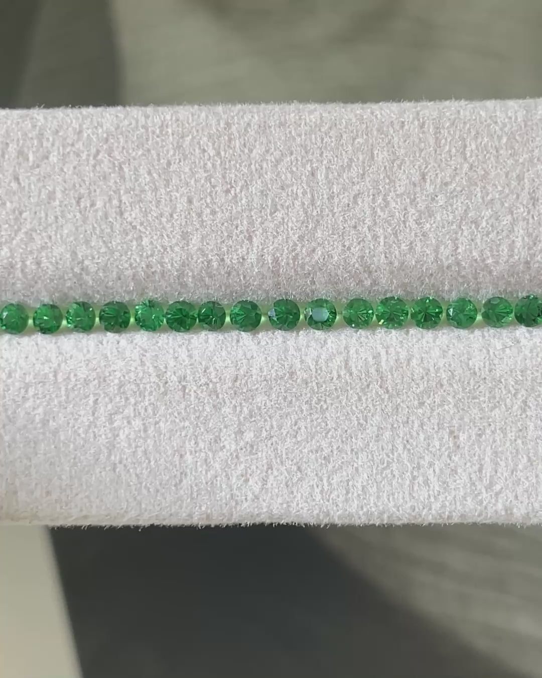 1.57 ct Top Colour Brilliant Tsavorite Set from Kenya, face-up, view 2