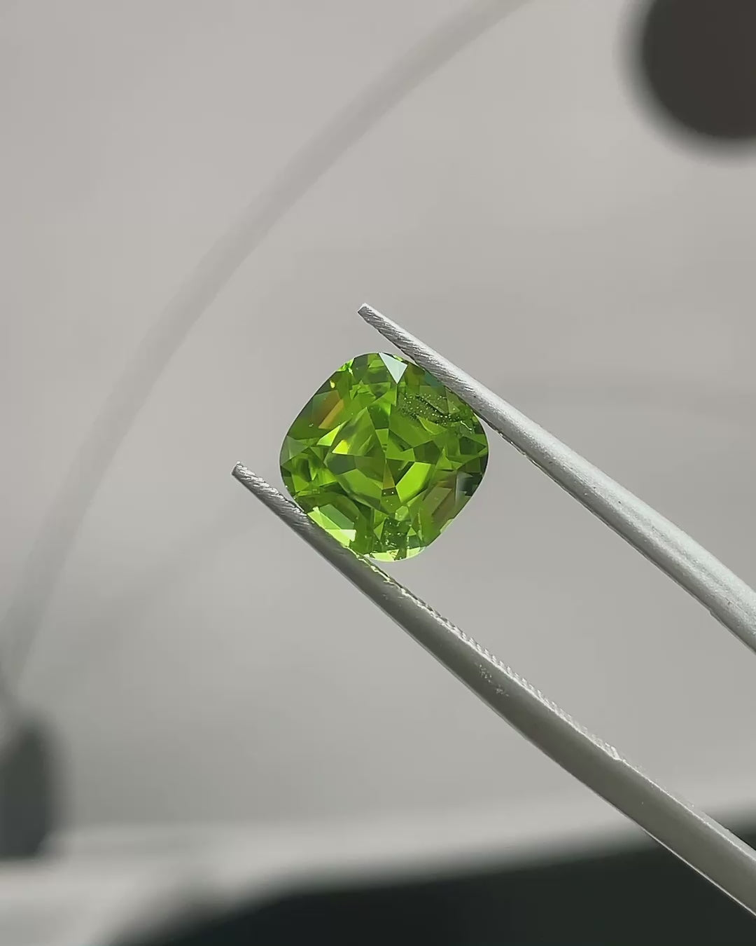 2.95 ct Apple Green Peridot from Pakistan, precision cut, face-up, view 3